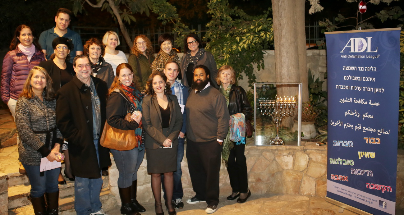 Echoes and Reflections Facilitators light Hanukkah candles at Yad Vashem - December 2015