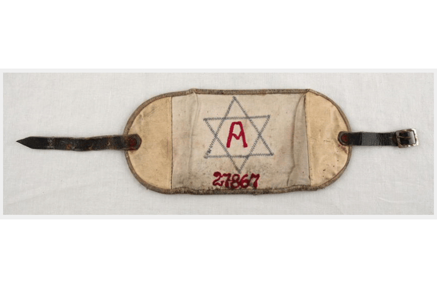 Essential Worker Armband from the Lwow Ghetto Worn by Paulina Chiger, courtesy of Yad Vashem Artifacts Collection, USC Shoah Foundation and Kristine Keren.
